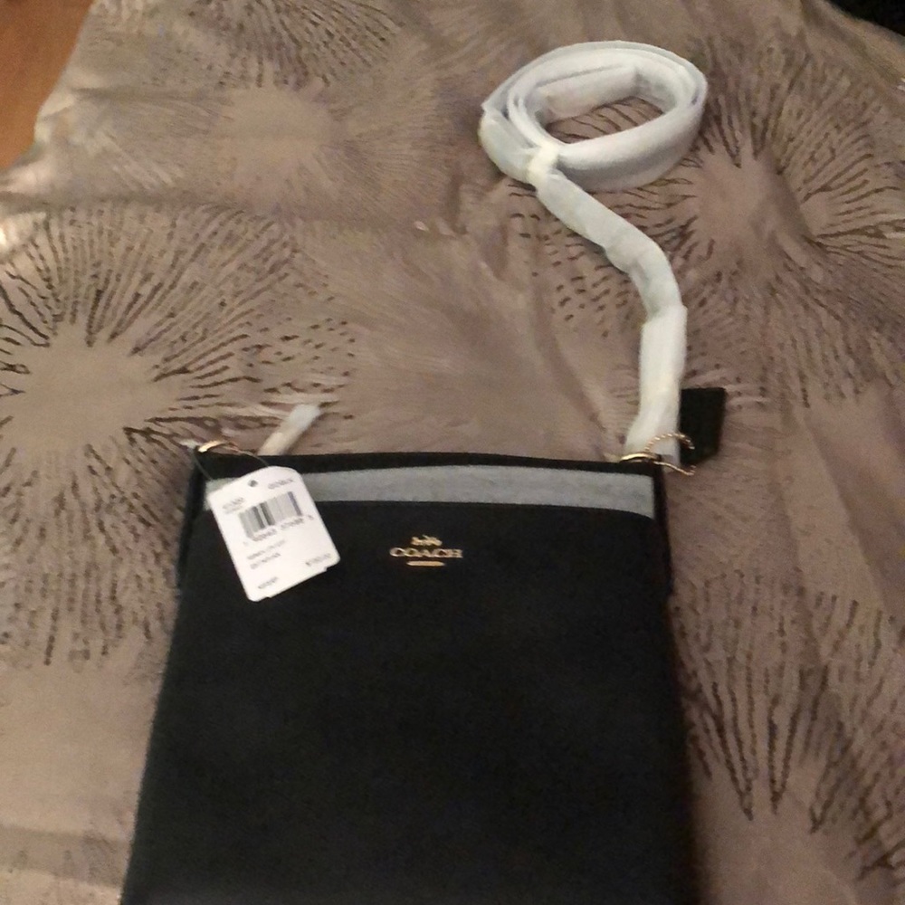 Coach Cross Body purse in Black Leather